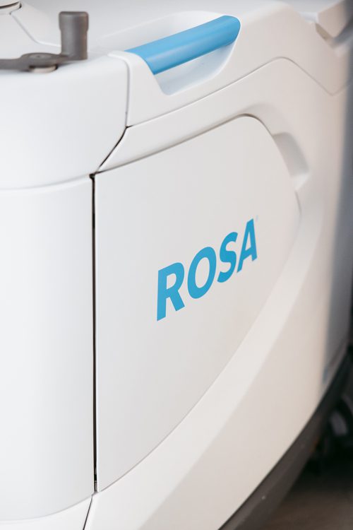 ROSA robotic system assisting with precise cutting guide placement during knee replacement surgery performed by Dr. Mina Morcos in Montreal